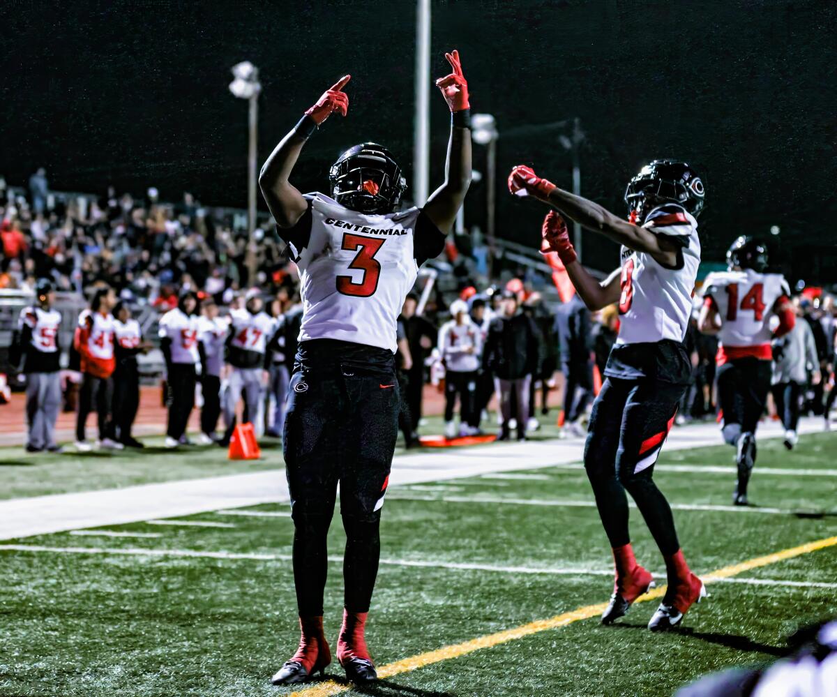 Malachi Roby (3) celebrates for Corona Centennial. He had 187 yards rushing and two touchdowns in win over Mission Viejo.