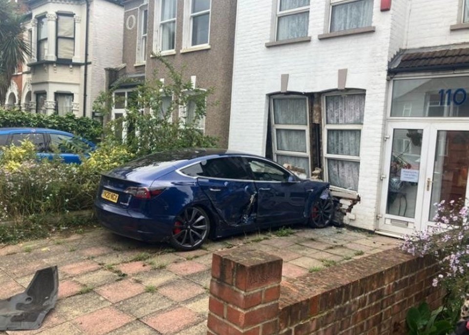 A stolen Tesla that was crashed into the front of a home belonging to an elderly woman who had recently passed away