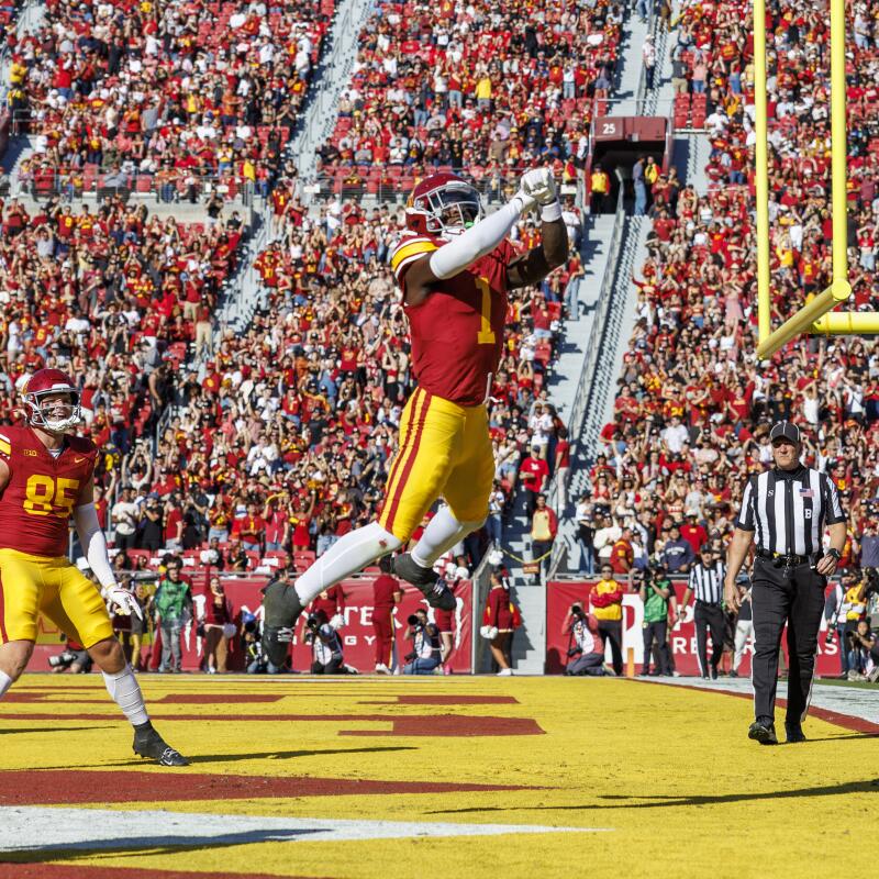 USC wide receiver Zachariah Branch celebrates after scoring a touchdown in the first half.