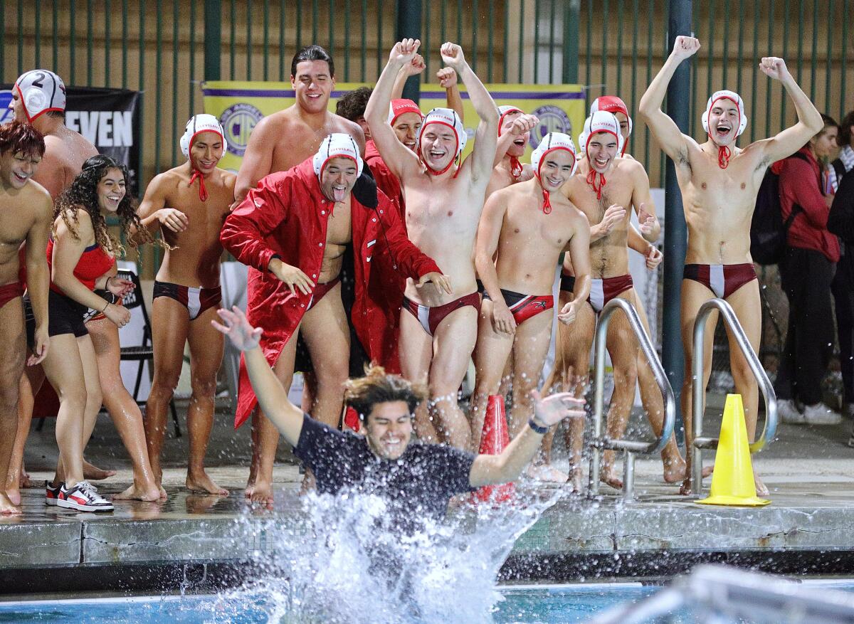 Cleveland players celebrate after dethroning Palisades 15-4 in the City Open Division final at Valley College.