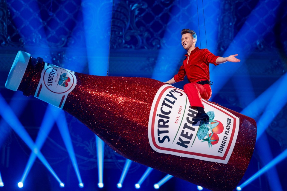 Jamie arrived at the studio on a gigantic ketchup bottle covered in glitter