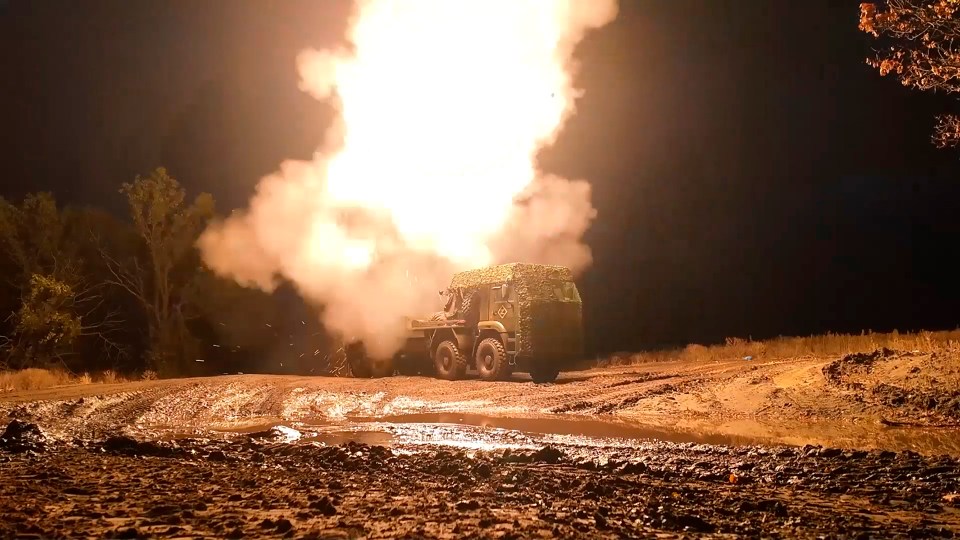 A Russian rocket launcher firing towards Ukrainian positions