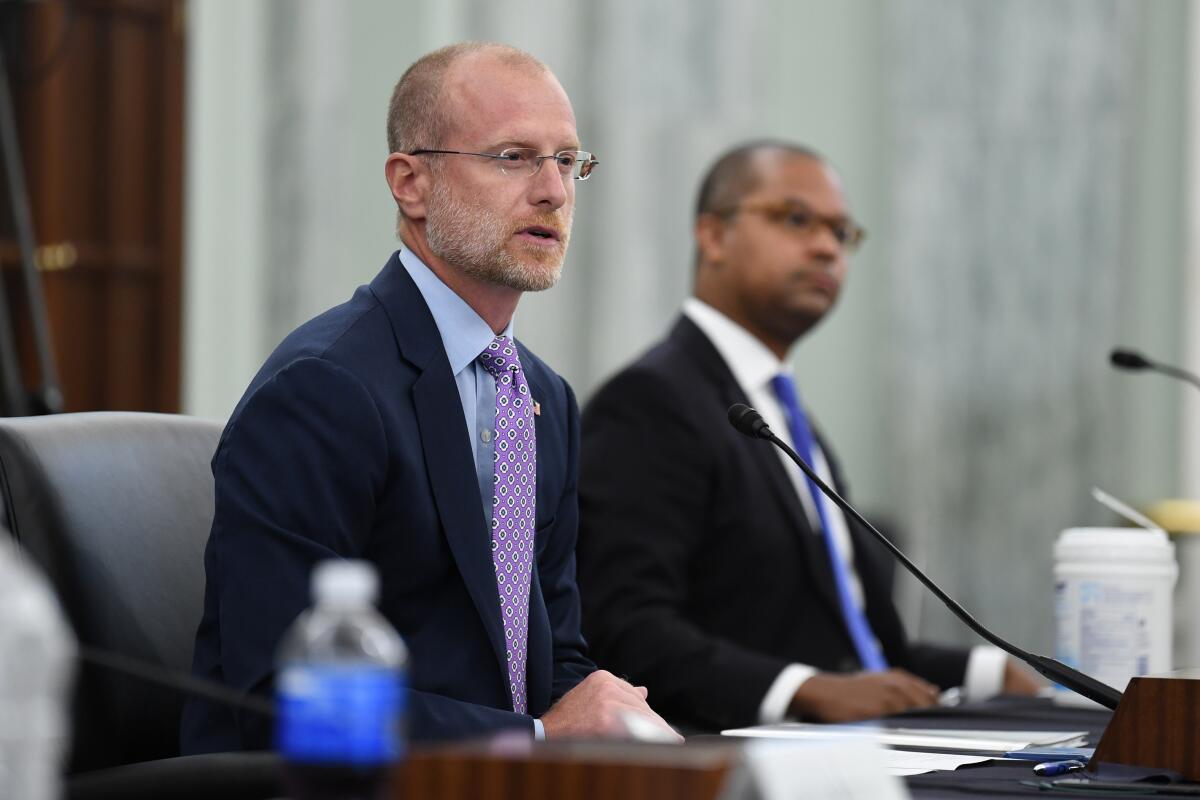 Brendan Carr answers questions during a hearing.