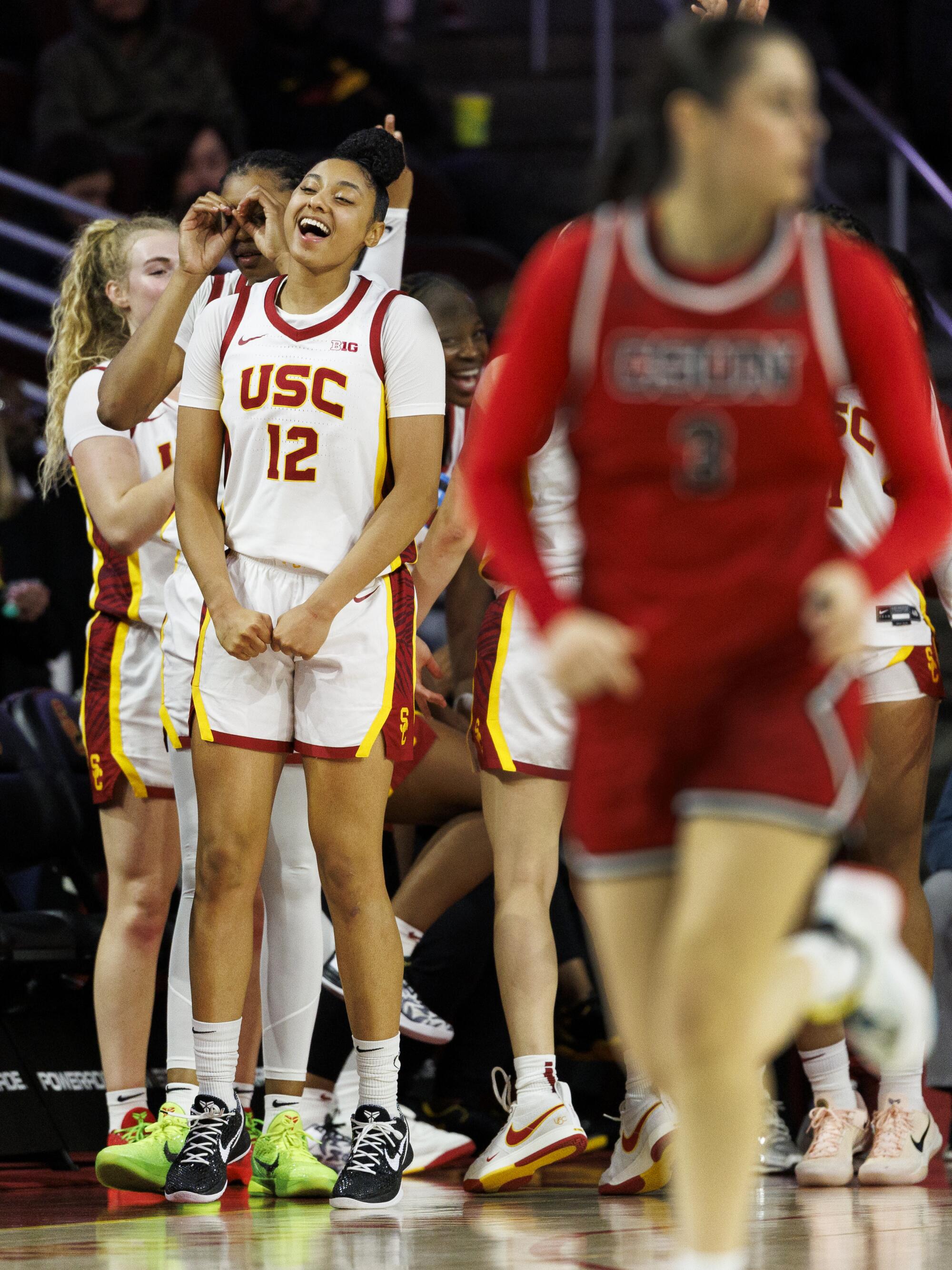 USC guard JuJu Watkins and her teammates celebrate during the Trojans' 124-39 win over Cal State Northridge on Nov. 12.