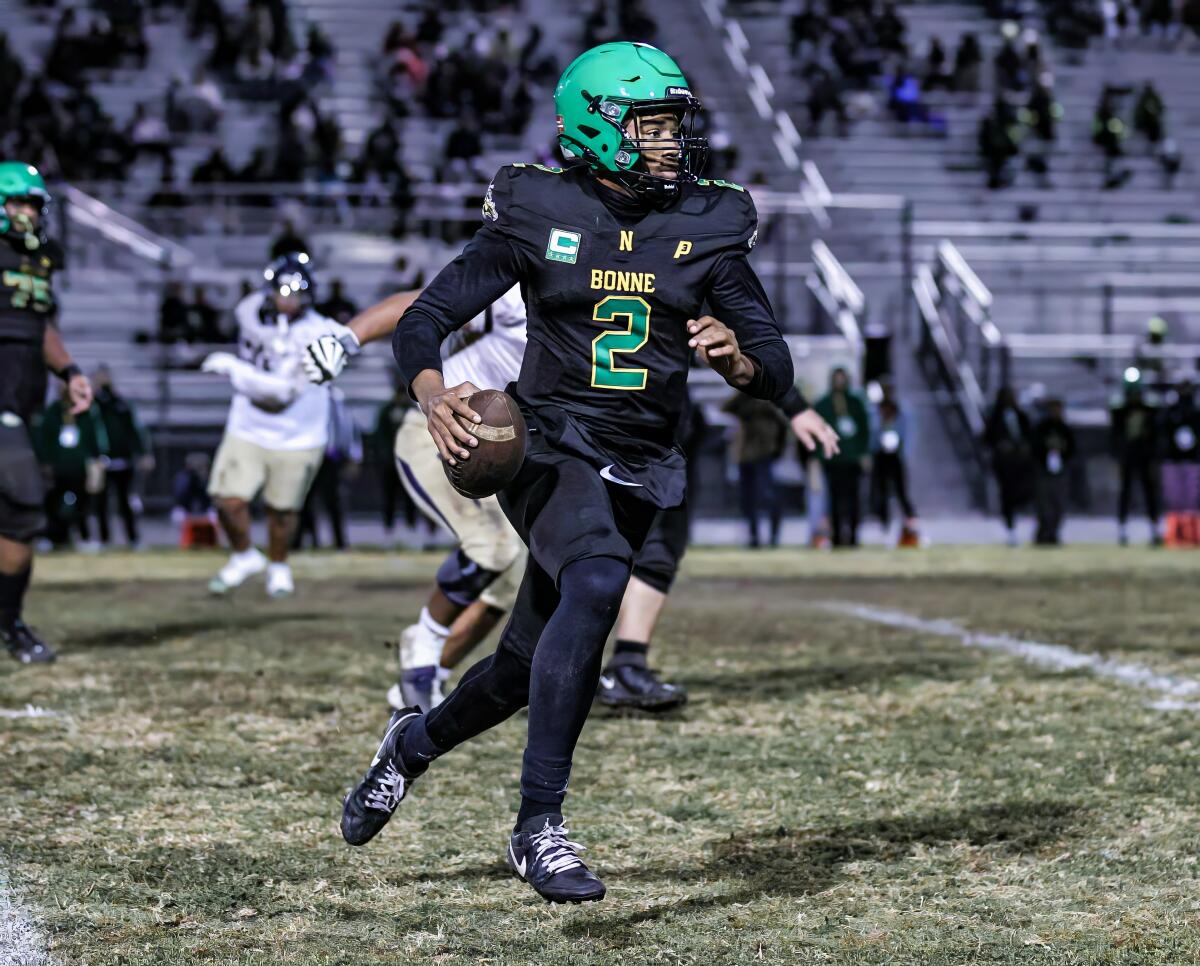 Narbonne quarterback Jaden O'Neal scrambles during 27-7 win over Birmingham.