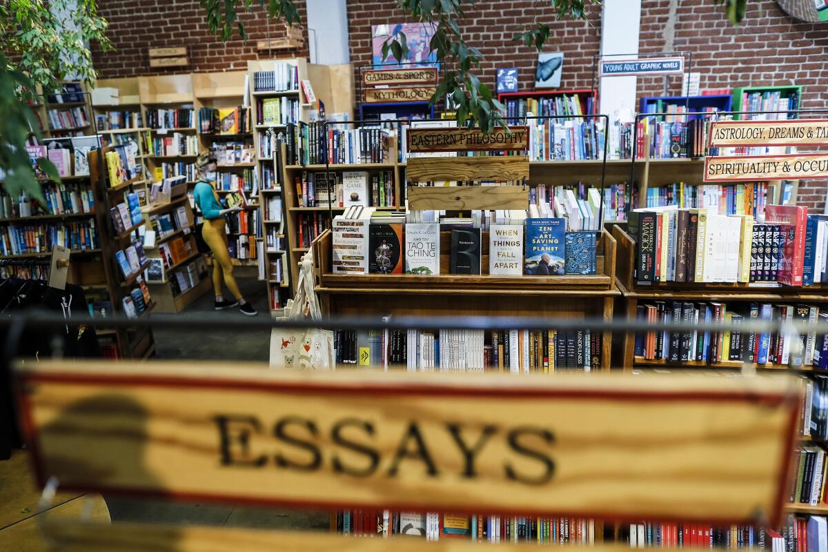 A bookstore patron wanders through the aisles inside Skylight Books in Los Feliz