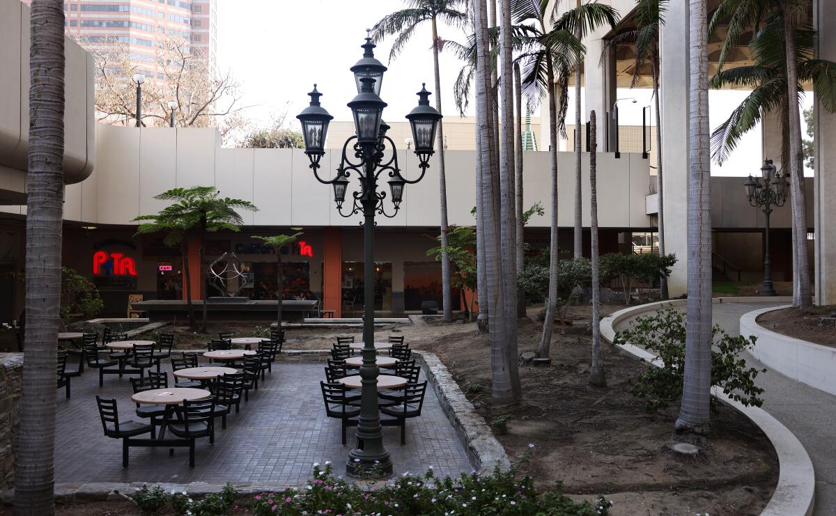 Empty tables at the Los Angeles Mall in downtown Los Angeles.