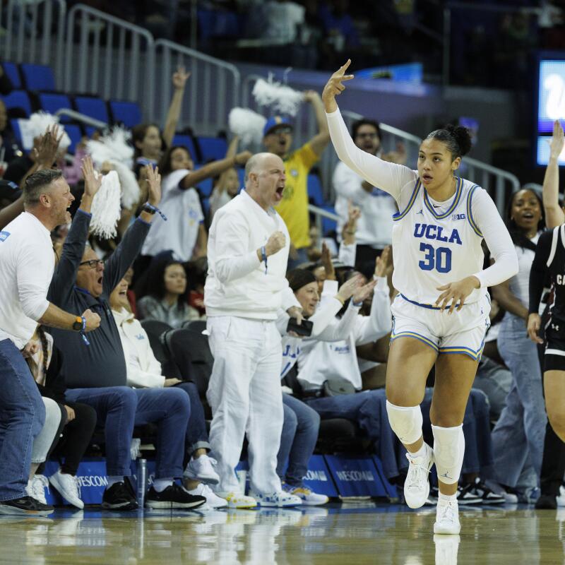 UCLA's Timea Gardiner reacts after making a three-pointer against South Carolina on Saturday.