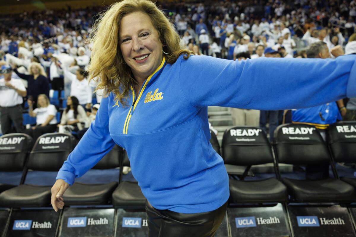 UCLA coach Cori Close walks on the court at Pauley Pavilion.