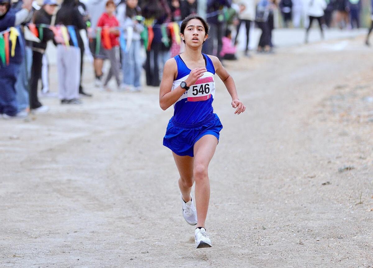 Ananya Balaraman of North Hollywood wins the City DI girls cross country race in 17:38 at Pierce College.