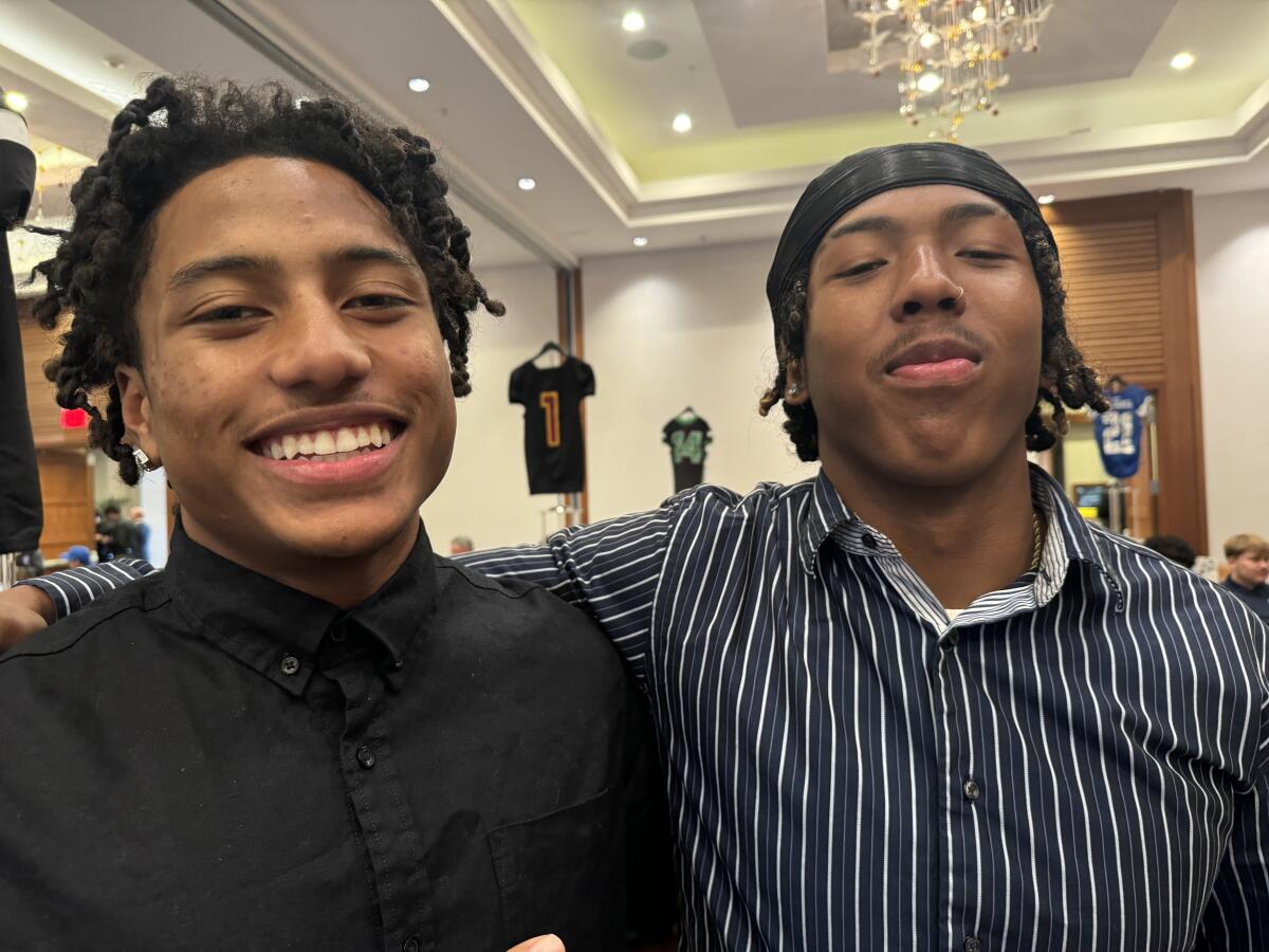 Oxnard Pacifica receivers Isaiah Dillon (left) and Savion Taylor pose for a photo.