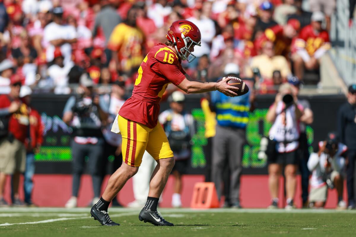 USC's Eddie Czaplicki punts the ball against Penn State last month at the Coliseum.