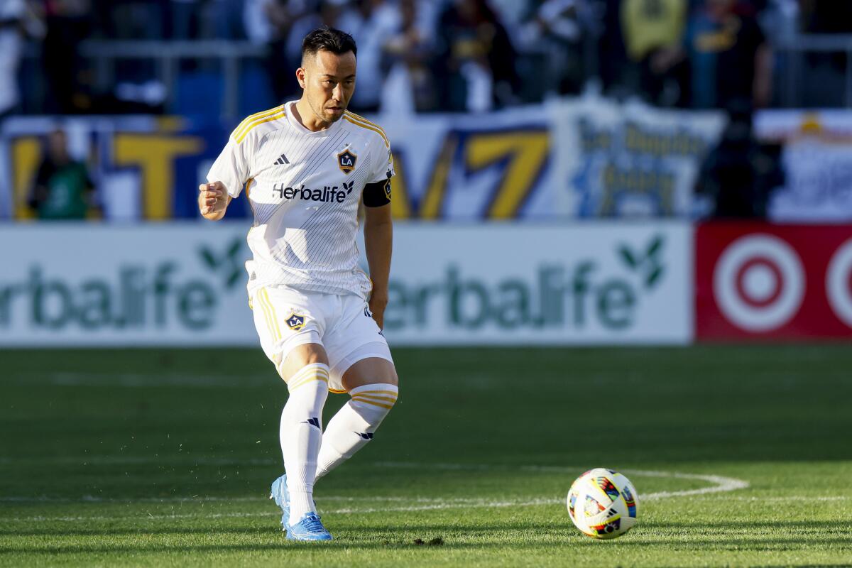 Galaxy's Maya Yoshida passes the ball during the team's win over Minnesota United on Nov. 24.