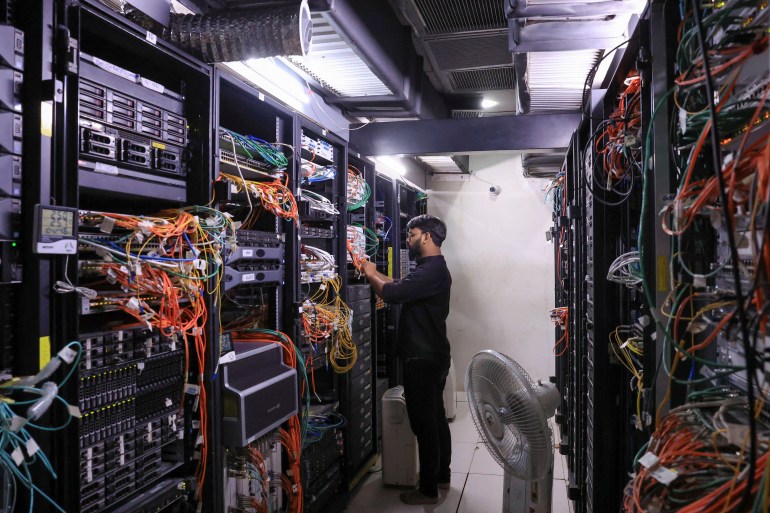 Technician Shiraz Ahmed, works at the data centre of Connect Communication, provider of high bandwidth and data connectivity solutions to customers, in Karachi, Pakistan August 22, 2024. REUTERS/Akhtar Soomro