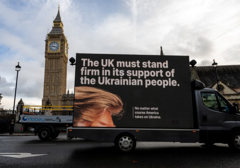 A digital advertising van, commissioned by Ukrainian campaigners, passes by the Elizabeth Tower, also known as Big Ben, with a message to urge Britain to stand firm against Russia's attack on Ukraine, in London, Britain, November 18, 2024. Chris Ratcliffe/Handout via REUTERS THIS IMAGE HAS BEEN SUPPLIED BY A THIRD PARTY