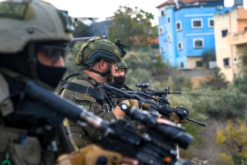 Israel Defense Forces soldiers are shown operating at the home of a Hamas gunman who opened fire at a bus in the West Bank city of Ariel on Friday. Four people were seriously injured in the attack. Photo by Israel Defense Forces/X