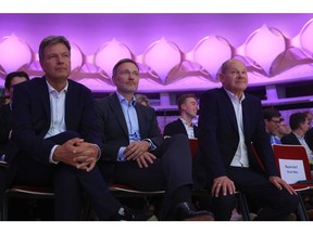 Robert Habeck, left, Christian Lindner, center, and Olaf Scholz. Photographer: Krisztian Bocsi/Bloomberg