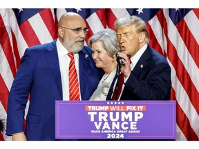 President-Elect Donald Trump, pictured with campaign co-managers Chris LaCivita and Susie Wiles, has expressed hostility to the Biden administration's climate law, but parts of it are proving politically popular.