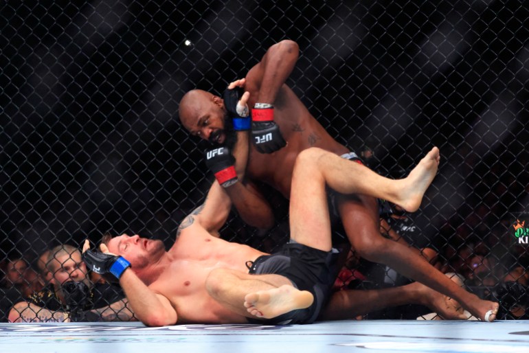 UFC Heavyweight Champion Jon Jones (R) fights challenger Stipe Miocic during their heavyweight title bout at Madison Square Garden in New York, on November 16, 2024. (Photo by Kena Betancur / AFP)