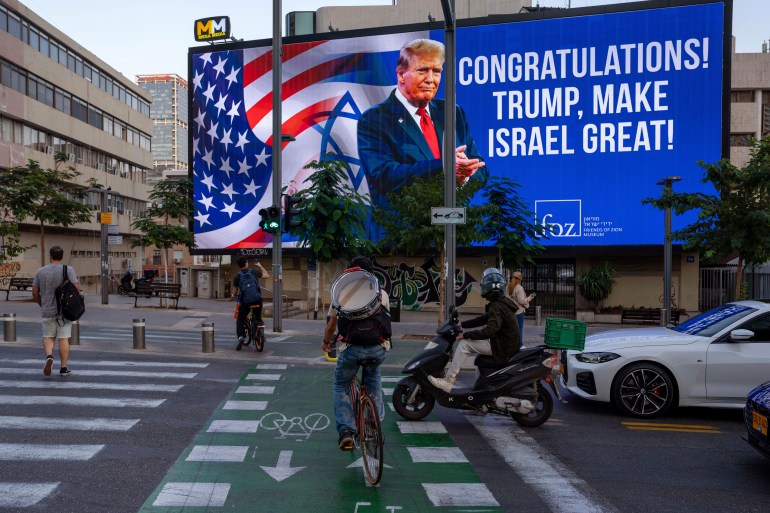 A billboard that displays a photo of U.S. President-elect Donald Trump and reads "Congratulations! Trump, make Israel great" is projected a day after the U.S. election, in Tel Aviv, Israel, on Wednesday, Nov. 6