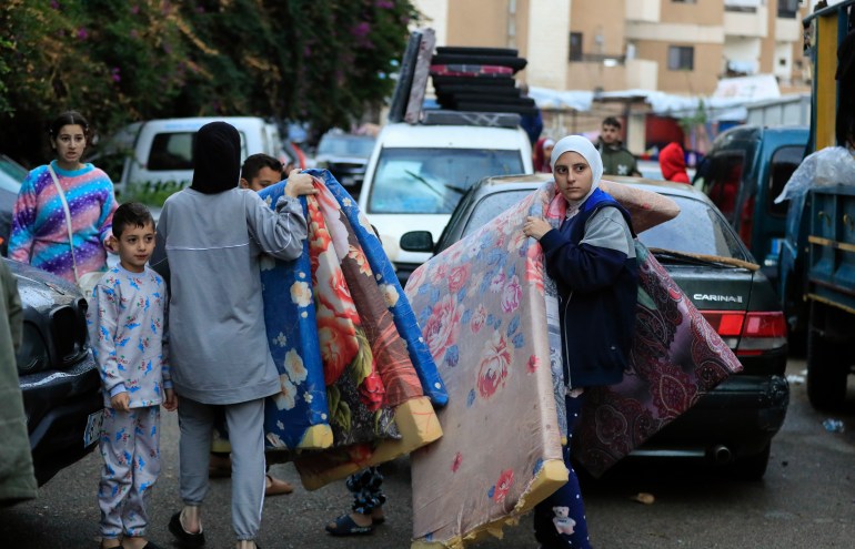 Displaced people return to south Lebanon as ceasefire appears to hold