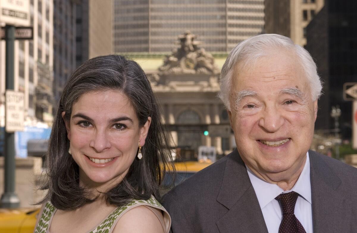 Arthur Frommer, right, and his daughter, Pauline Frommer, are photographed on Park Avenue.