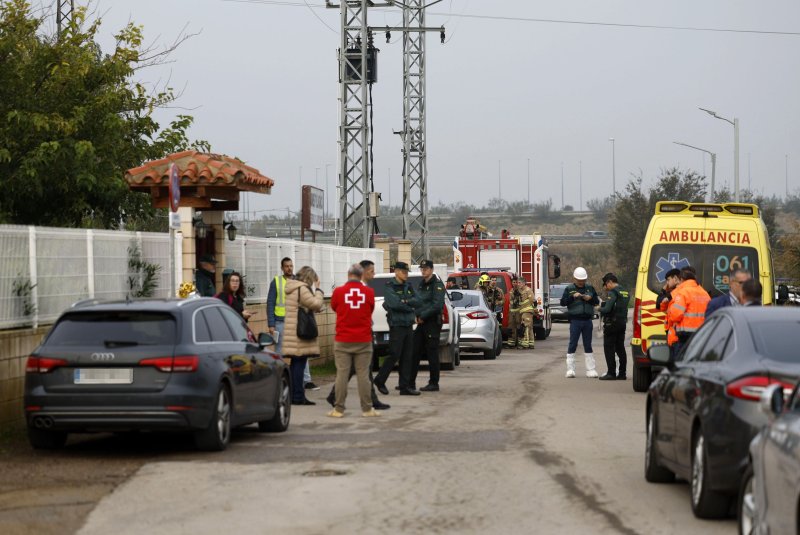 Emergency services and relatives outside a care home in Villafranca de Ebro, near Zaragoza, where 10 people were killed in a fire early Friday. Photo by Javier Cebollada/EPA-EFE