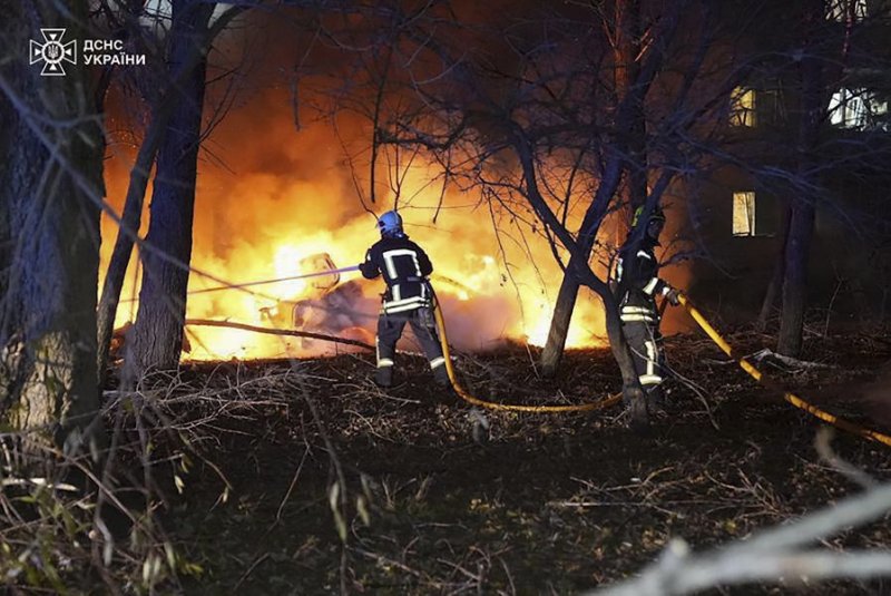 Firefighters tackle a blaze at the site of a missile strike on a residential building in Sumy, Ukraine, on Sunday night that killed 11 people, including a 9-year-old boy and a 14-year-old girl, and injured dozens. Photo by State Emergency Service of Ukraine/EPA-EFE