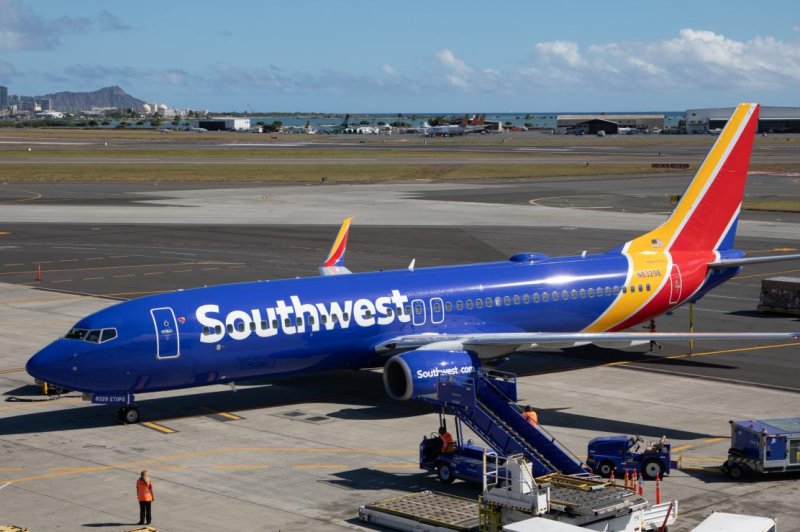 A Southwest Boeing 737-800 touches down at Daniel K. Inouye International Airport in Honolulu. The same model was struck by a bullet on Friday in Dallas. Photo courtesy Southwest Airlines