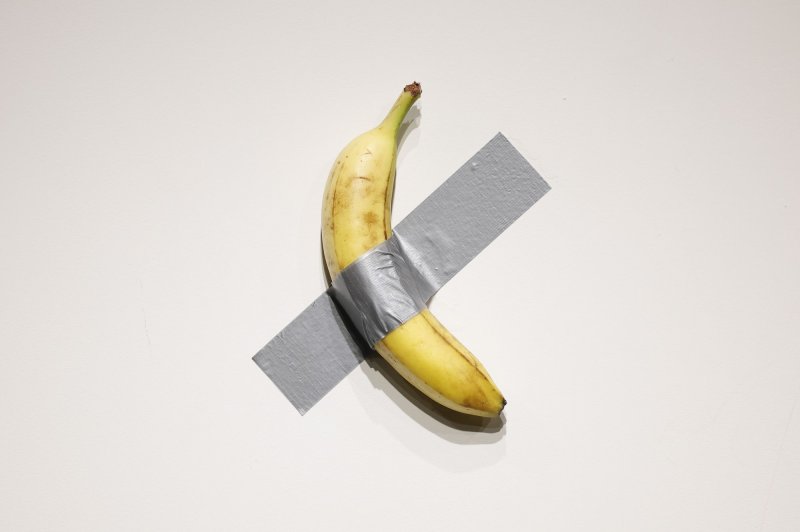 Maurizio Cattelan's "Comedian" is on display at a press preview for Sotheby's Evening Auction on Oct. 25 in New York City, during which Justin Sun bid $6.2 million for the artwork and on Friday ate the banana during a Hong Kong press conference. File Photo by John Angelillo/UPI