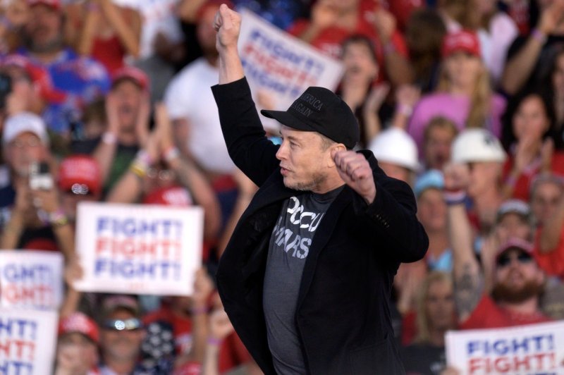 Billionaire Elon Musk rallies supporters for former President Donald Trump at the Butler Farm Show grounds in Pennsylvania on October 5. On Monday, a judge in Pennsylvania declined to issue an injunction against Musk's America PAC, allowing a $1 million daily giveaway to registered voters to continue. Photo by Archie Carpenter/UPI.