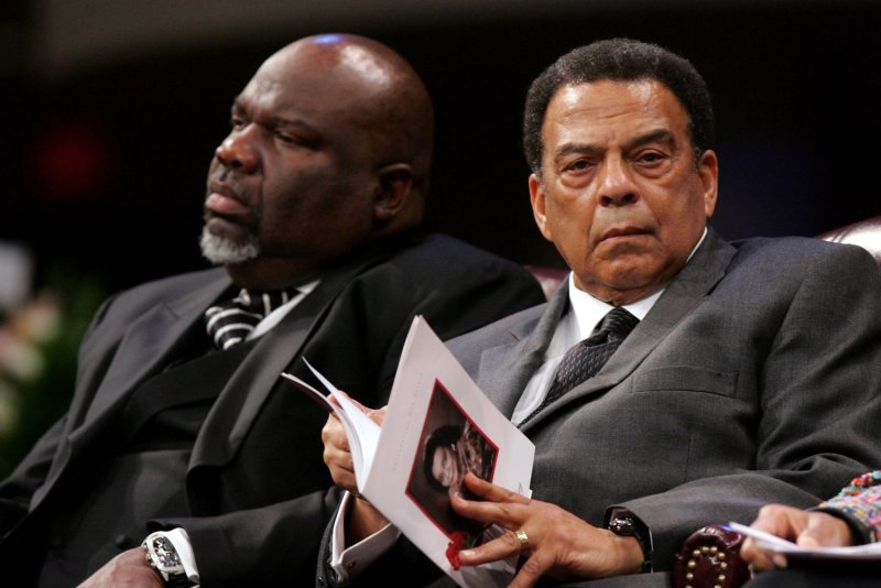 Rev. T.D. Jakes (L) and former U.S. United Nations ambassador Andrew Young listen during funeral services for Coretta Scott King in 2006. Jakes suffered a medical emergency shortly after preaching at his Dallas, Texas church Sunday. (UPI Photo/Ric Feld/Pool)