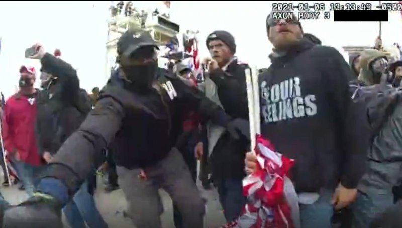 A still taken from body camera footage showing Leander Antwione Williams during the Jan. 6, 2021, assault on the Capitol in Washington, D.C. Image courtesy the Justice Department