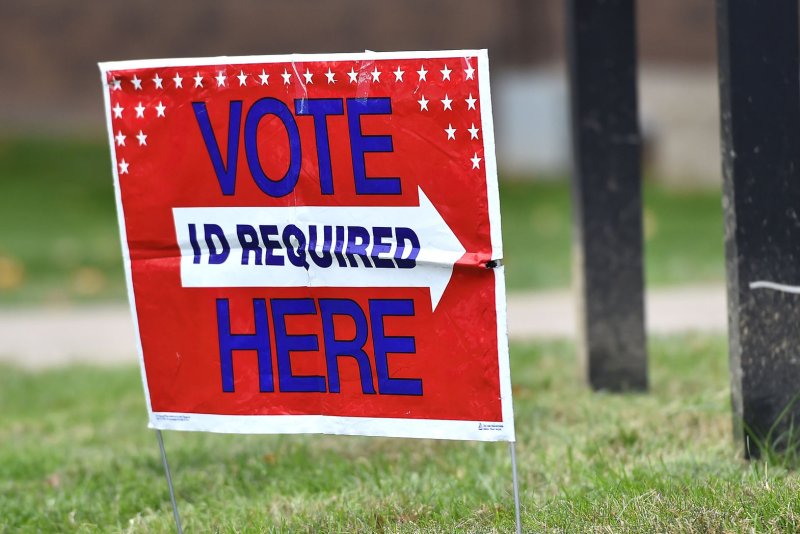 On Friday, the Justice Department said the Civil Rights Division will coordinate an effort to monitor compliance with federal voting rights laws in 86 jurisdictions in 27 states -- including all seven battleground states -- during the general election on Tuesday. File Photo by Kevin Dietsch/UPI