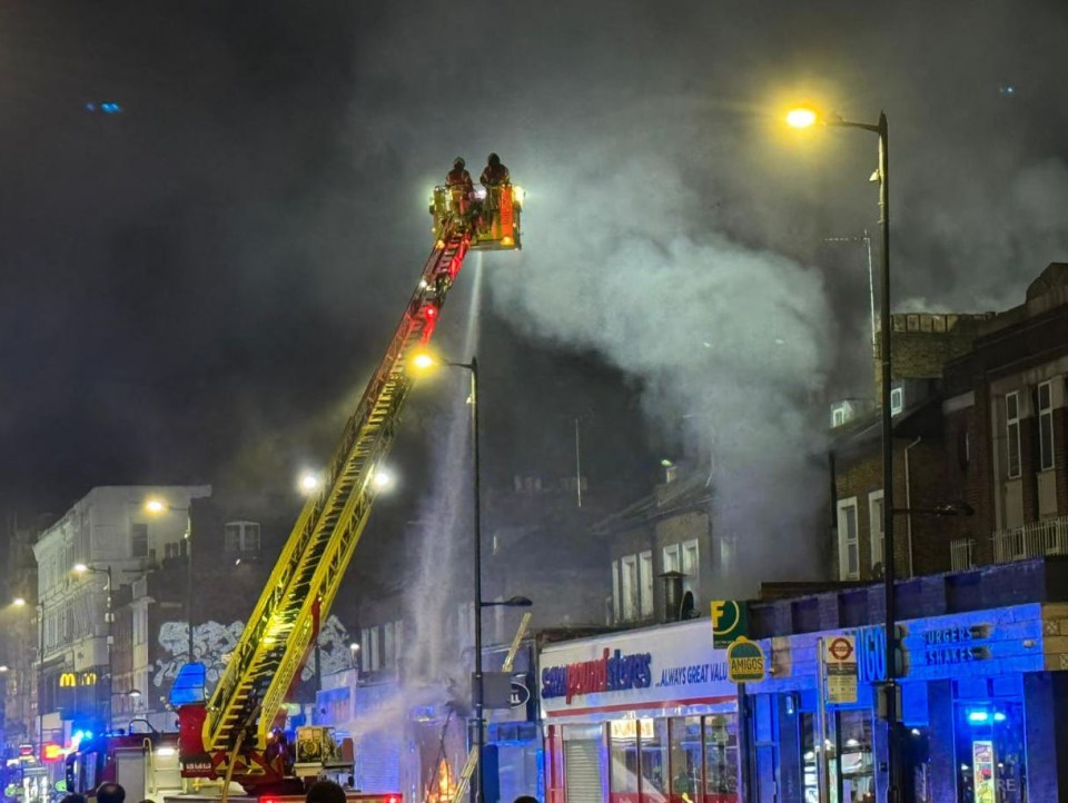 The London Fire Brigade attending the scene of a fire at a takeaway restaurant in Holloway, north London