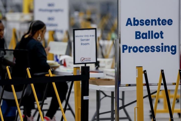 Elections workers in Georgia process absentee ballots Monday, as Georgia’s Supreme Court reversed a lower court’s 3-day ballot extension in the swing state. The court ruled that 3,000 absentee ballots -- which were sent out late in Cobb County -- will only be counted if they are received by Election Day. File Photo by Erik S. Lesser/EPA-EFE