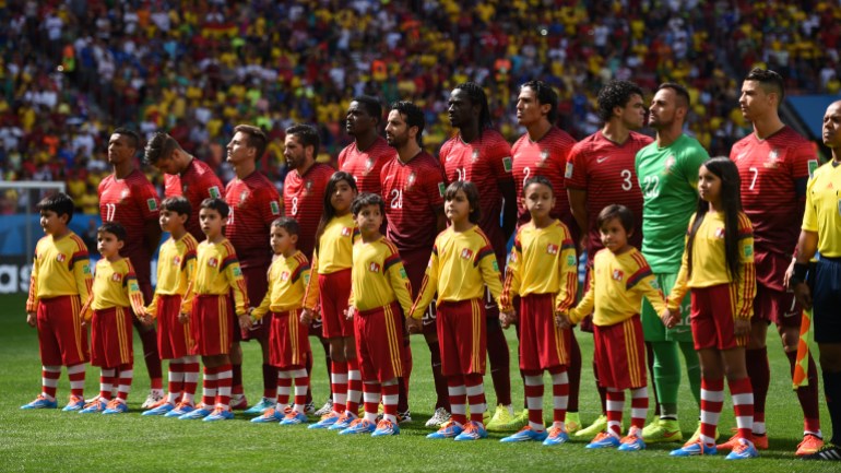 (L-R) Nani, Miguel Veloso, Joao Pereira, Joao Moutinho, William, Ruben Amorim, Eder, Bruno Alves, Pepe, goalkeeper Beto, Cristiano Ronaldo of Portugal line up prior to the FIFA World Cup 2014 group G preliminary round match between Portugal and Ghana at the Estadio National Stadium in Brasilia, Brazil, on 26 June 2014. Photo: Marius Becker/dpa (RESTRICTIONS APPLY: Editorial Use Only, not used in association with any commercial entity - Images must not be used in any form of alert service or push service of any kind including via mobile alert services, downloads to mobile devices or MMS messaging - Images must appear as still images and must not emulate match action video footage - No alteration is made to, and no text or image is superimposed over, any published image which: (a) intentionally obscures or removes a sponsor identification image; or (b) adds or overlays the commercial identification of any third party which is not officially associated with the FIFA World Cup) EDITORIAL USE ONLY | usage worldwide (Photo by Marius Becker/picture alliance via Getty Images)