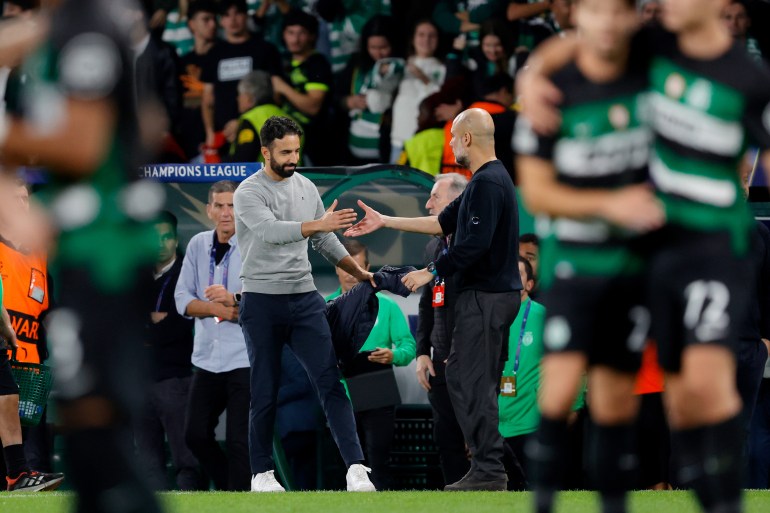 LISBON, PORTUGAL - NOVEMBER 5: Coach Pep Guardiola of Manchester City congratulates coach Ruben Amorim of Sporting CP during the UEFA Champions League match between Sporting CP v Manchester City at the Estadio Jose Alvalade on November 5, 2024 in Lisbon Portugal (Photo by Eric Verhoeven/Soccrates/Getty Images)