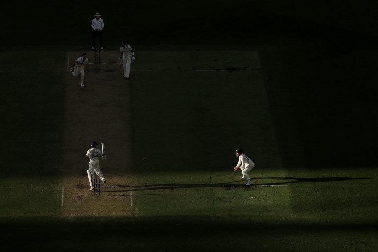 PERTH, AUSTRALIA - NOVEMBER 23: Travis Head of Australia fields the ball during day two of the First Test match in the series between Australia and India at Perth Stadium on November 23, 2024 in Perth, Australia. (Photo by Cameron Spencer/Getty Images)