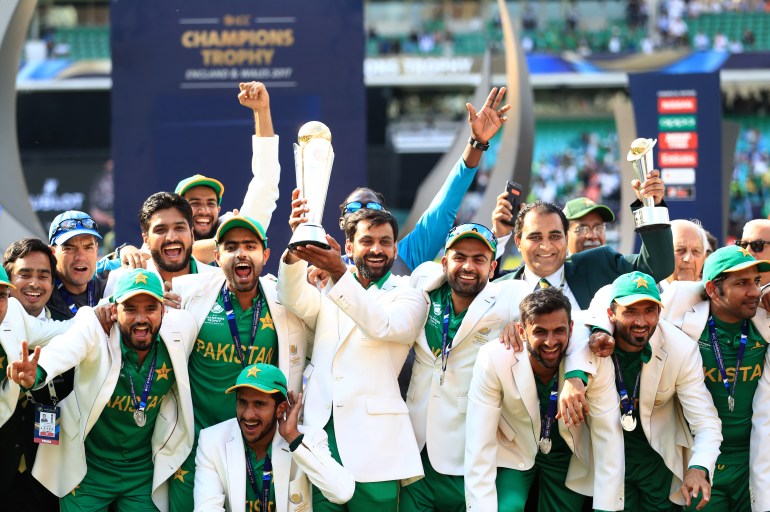 Pakistan cricket players celebrate victory.