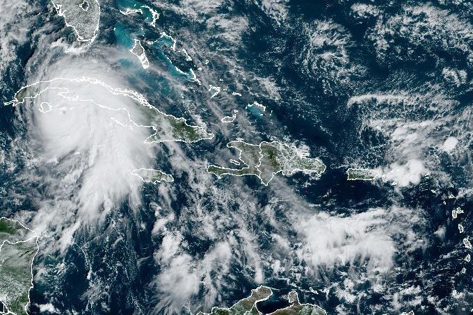 Rafael intensified into a Category 2 storm as it neard Cuba on Wednesday morning. Image courtesy NOAA