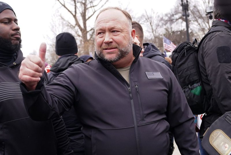 Infowars' Alex Jones greets supporters of President Donald Trump at a rally in Washington, D.C., on January 5, 2021. This week, Jones was expected to appear in court to challenge his studio and other assets being sold to The Onion. File Photo by Kevin Dietsch/UPI