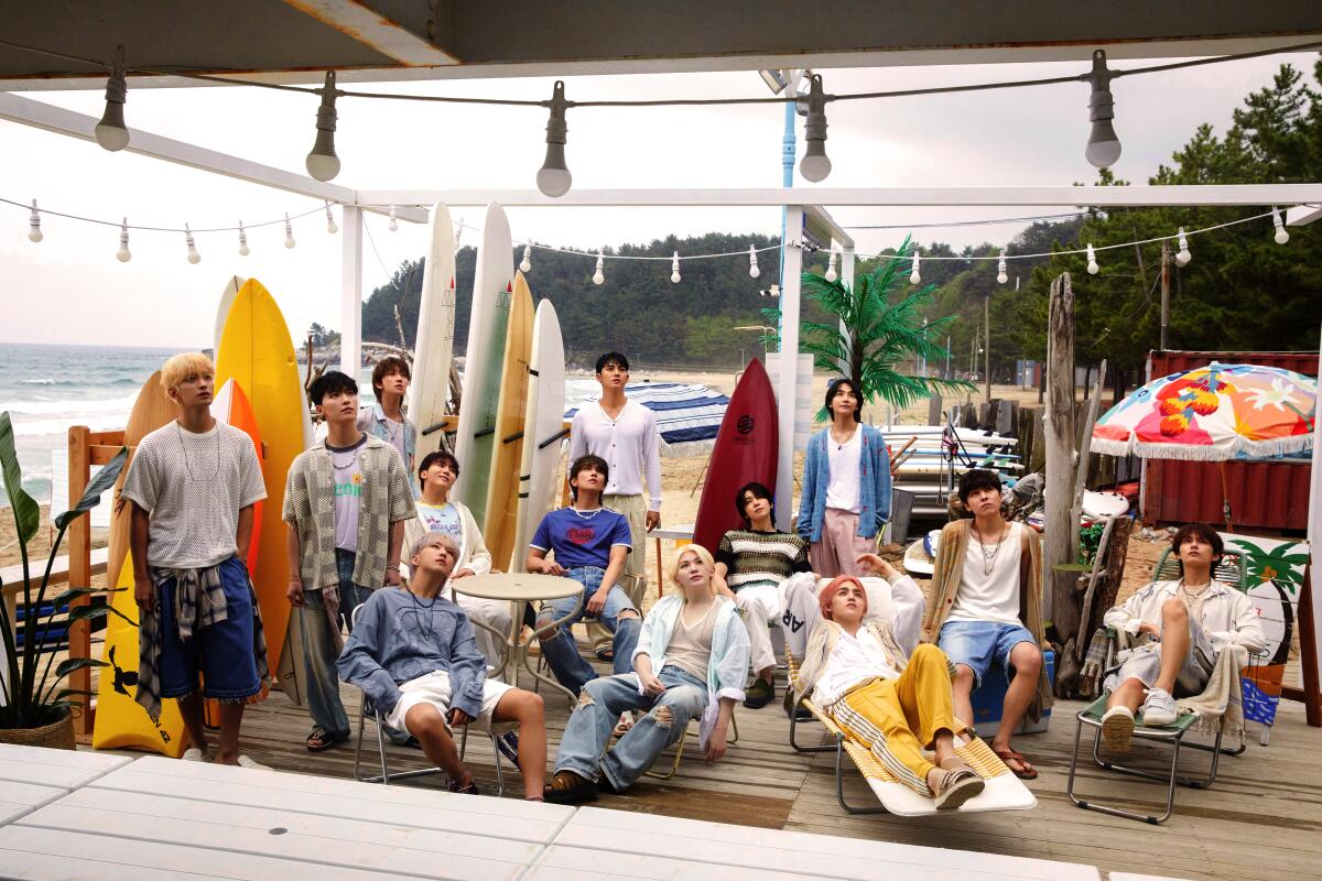 Group of men on a deck at the beach