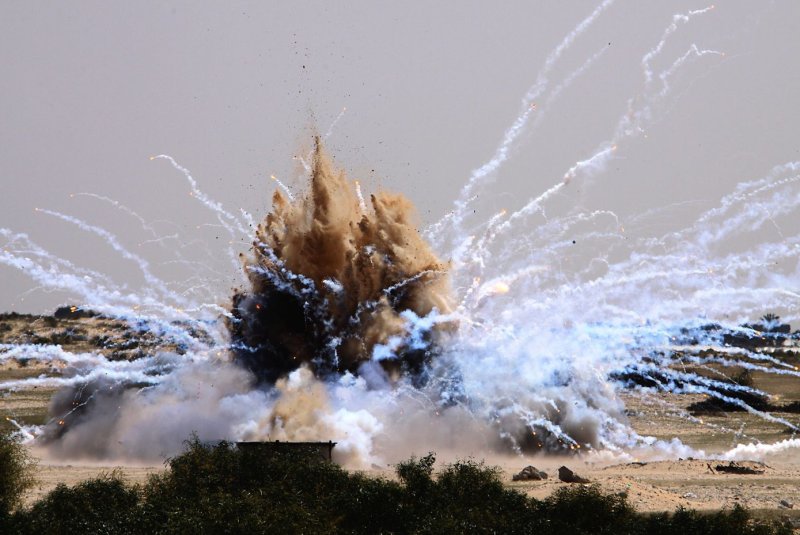 White phosphorous munitions are blown up by UN and Hamas sappers in Rafah in the southern Gaza Strip in March 2010. File Photo by Mohammed Saber/EPA