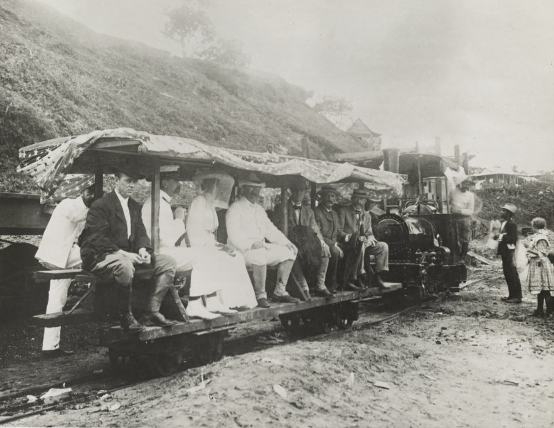 President Theodore Roosevelt and his wife, Edith, both dressed in white, sit on a flag-draped railroad tram during their tour of the Panama Canal Zone in 1906. File Photo courtesy of the Library of Congress