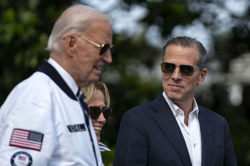 Hunter Biden (R) looks towards President Joe Biden and Valerie Biden Owens while exiting the White House to board Marine One en route to Camp David in Washington, D.C., on July 26. The White House on Thursday reiterated that Joe Biden has no intentions on pardoning his son, who is to be sentenced next month on firearms and tax-related charges. File Photo by Bonnie Cash/UPI