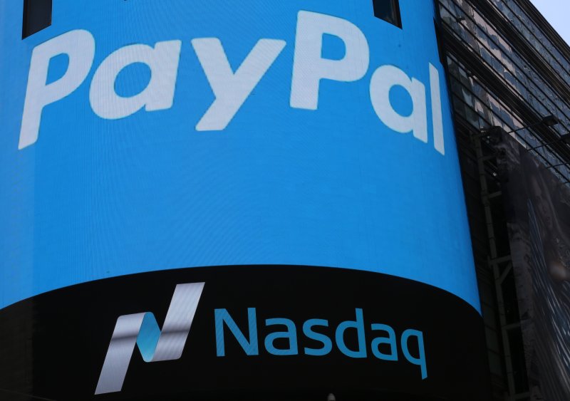 A PayPal logo on the side of the Nasdaq digital board in Times Square in New York in 2015. File Photo by Andrew Gombert/EPA