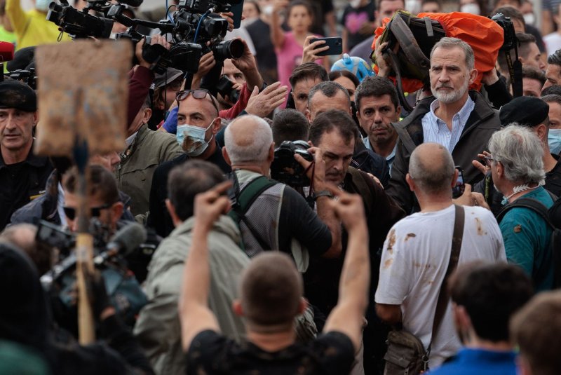 Spain's King Felipe on Sunday visited the province of Valencia where a crowd of angry citizens tossed eggs and mud and shouted insults at the royal family and other officials. Photo by Biel Alino/EPA-EFE