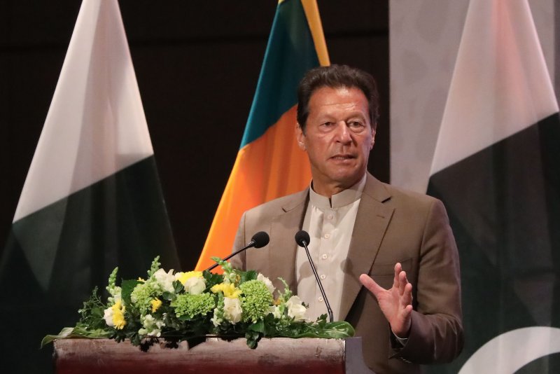 Former Pakistan Prime Minister Imran Khan speaks during the Pakistan-Sri Lanka Trade and Investment Conference in Colombo, Sri Lanka, on February 24, 2021. Khan's supporters marched toward Islamabad on Monday. File Photo by Chamila Karunarathe/EPA-EFE