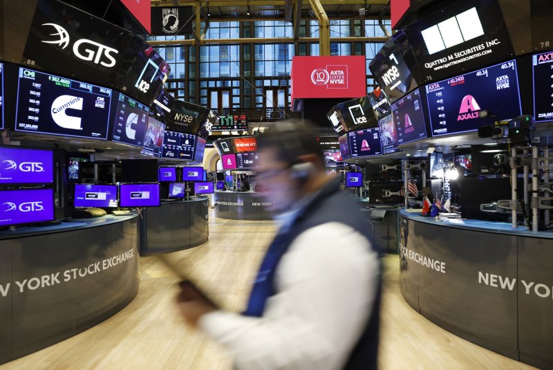 Traders work on the floor of the New York Stock Exchange on Wall Street on Monday, November 18, 2024 in New York City. U.S. stocks climbed slightly on Monday and Tesla (TSLA) shares continued its post-election rally. Photo by John Angelillo/UPI